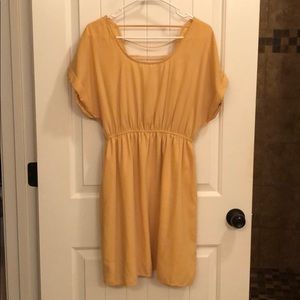 yellow short sleeve dress with cute back detail
